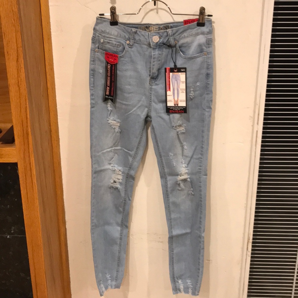 Distressed blue jeans